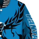 personalized carolina panthers winged blaze blue white varsity jacket best selling.webp