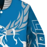 personalized detroit lions winged blaze blue white varsity jacket best selling.webp