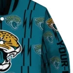 personalized jacksonville jaguars bolt stripe teal varsity jacket best selling.webp