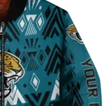 personalized jacksonville jaguars pyramid shapes teal bomber jacket best selling