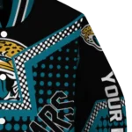 personalized jacksonville jaguars star burst teal varsity jacket best selling.webp